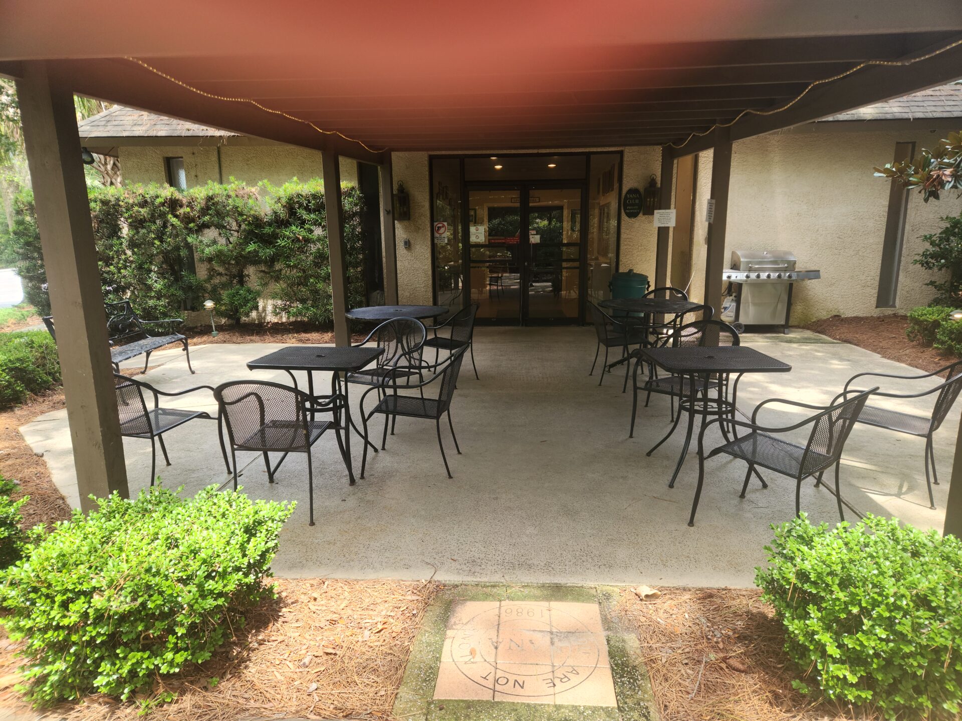 Outdoor patio with tables and chairs Outdoor patio with tables and chairs
